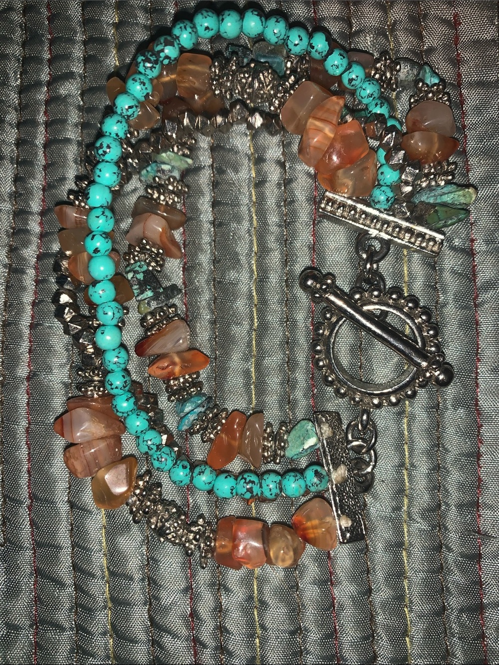 Turquoise/carnelian multi-strand bracelet.
Toggle clasp